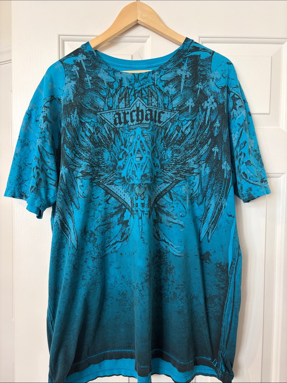 Archaic Men’s Short-Sleeve Graphic Tee in Teal Blue with Black Print